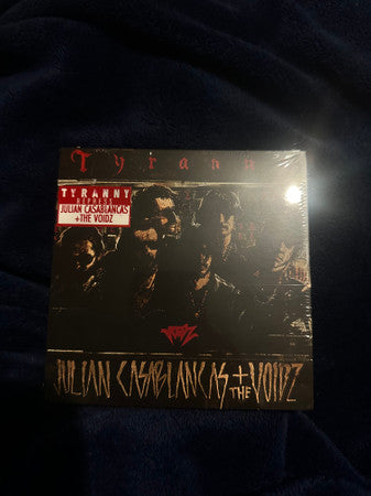 CD case for The Voidz’s “Tyranny” album, with a group portrait.
