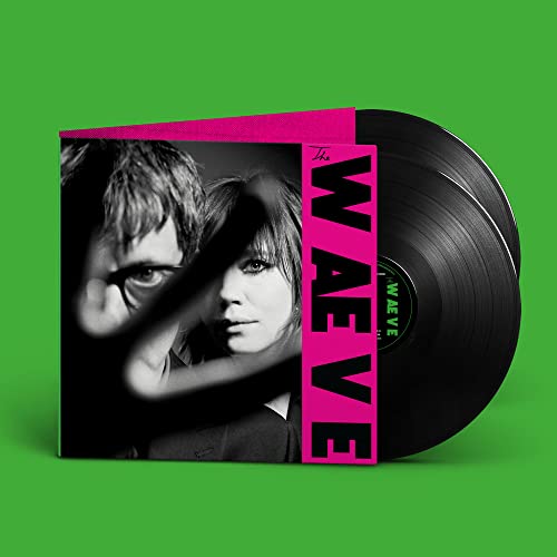 Vinyl record with album cover featuring two people in pink text.