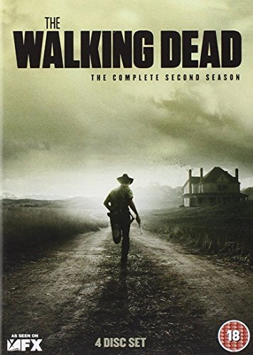 DVD cover for "The Walking Dead" Season 2, showing a man walking down a dirt road.