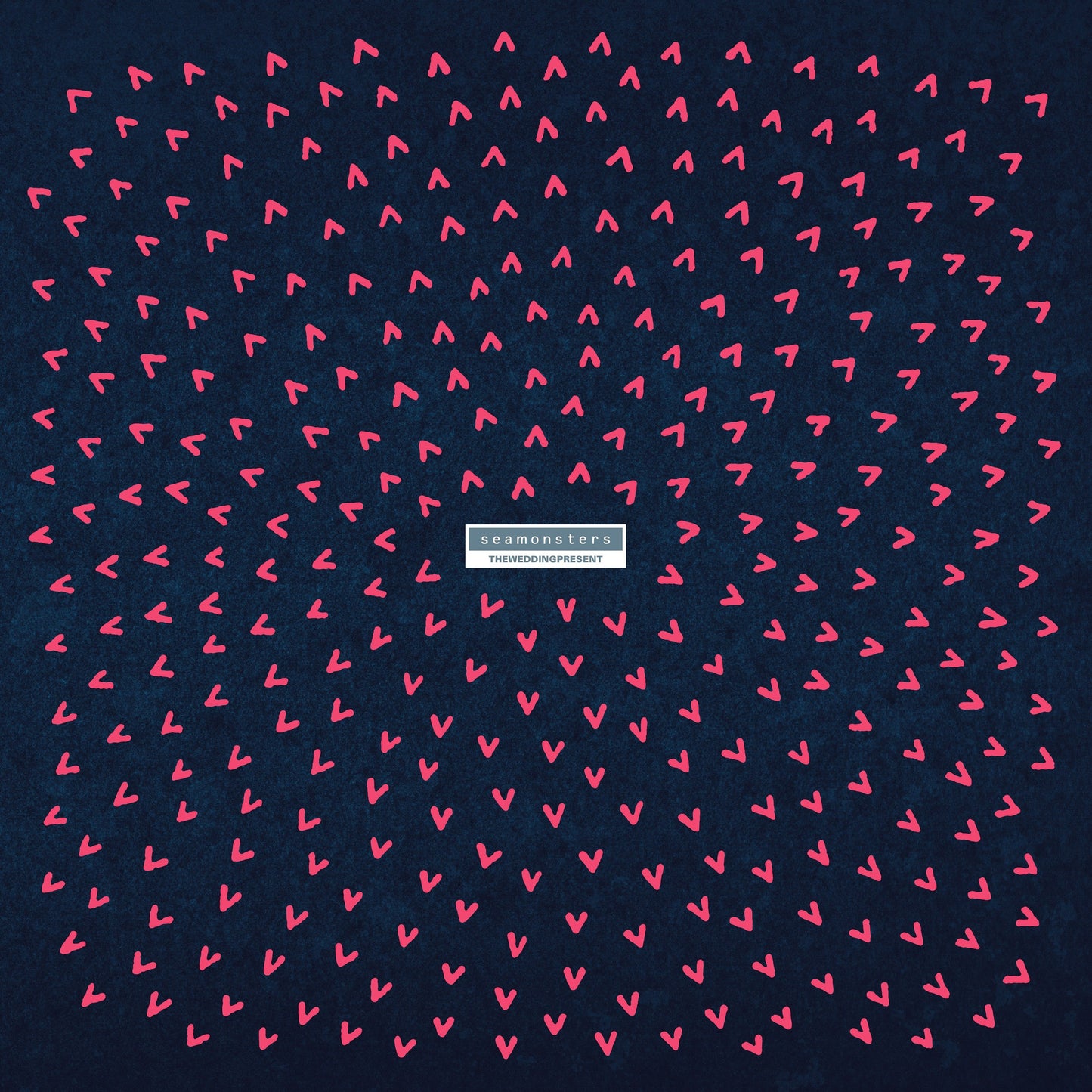 Blue album cover with pink abstract shapes and band/album title text.