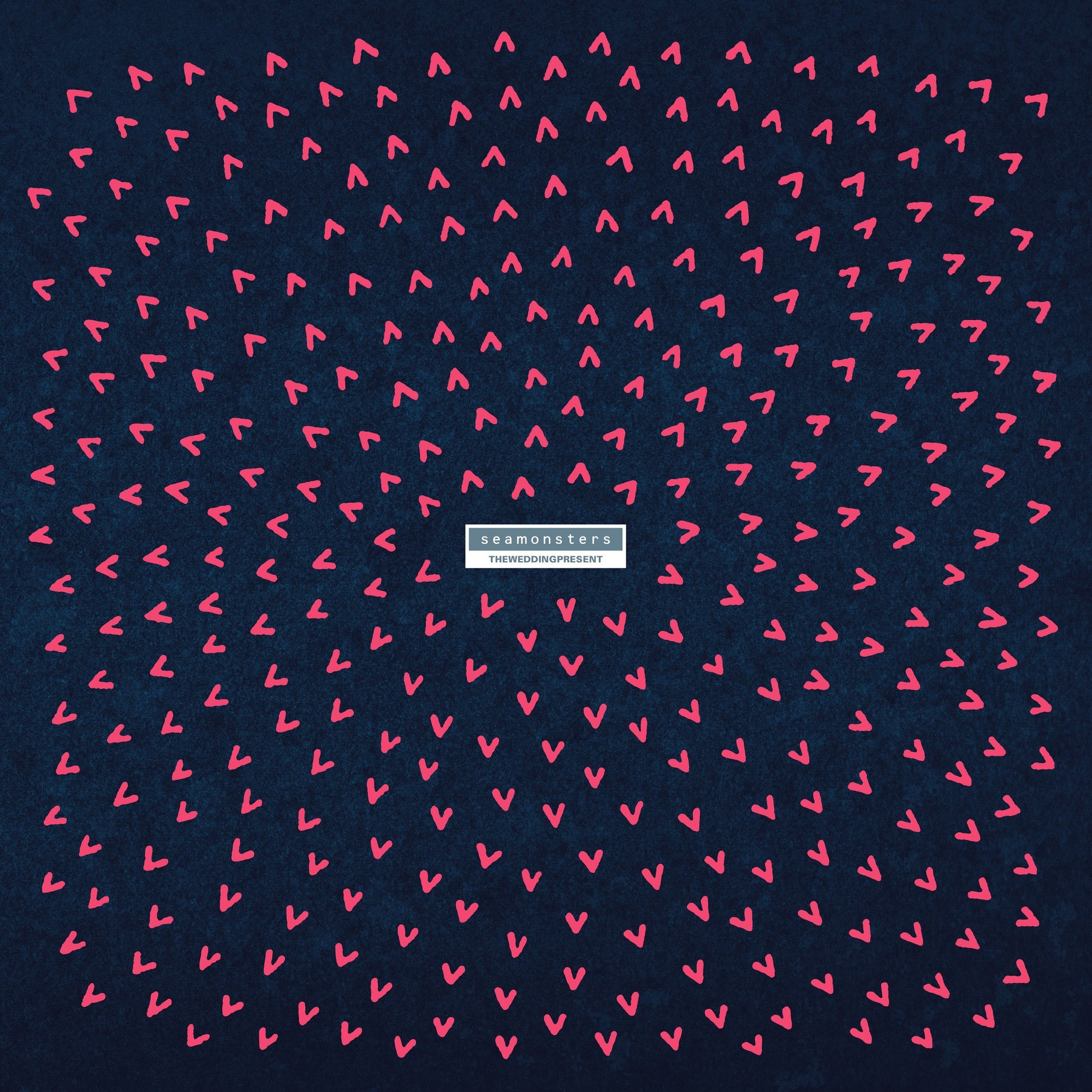Blue album cover with pink abstract shapes and band/album title text.
