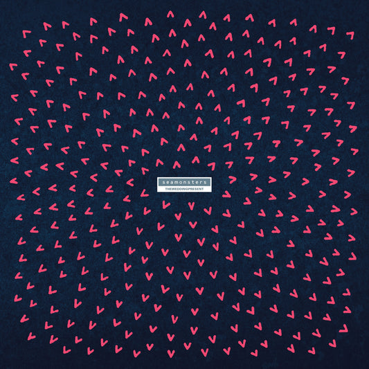 Blue album cover with pink abstract shapes and band/album title text.