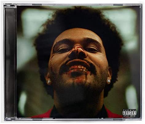 The Weeknd's album cover featuring a man with blood on his face and chin.