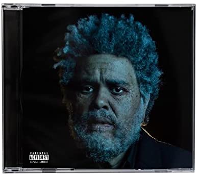 The Weeknd's album cover: a man with afro and beard against a black background.