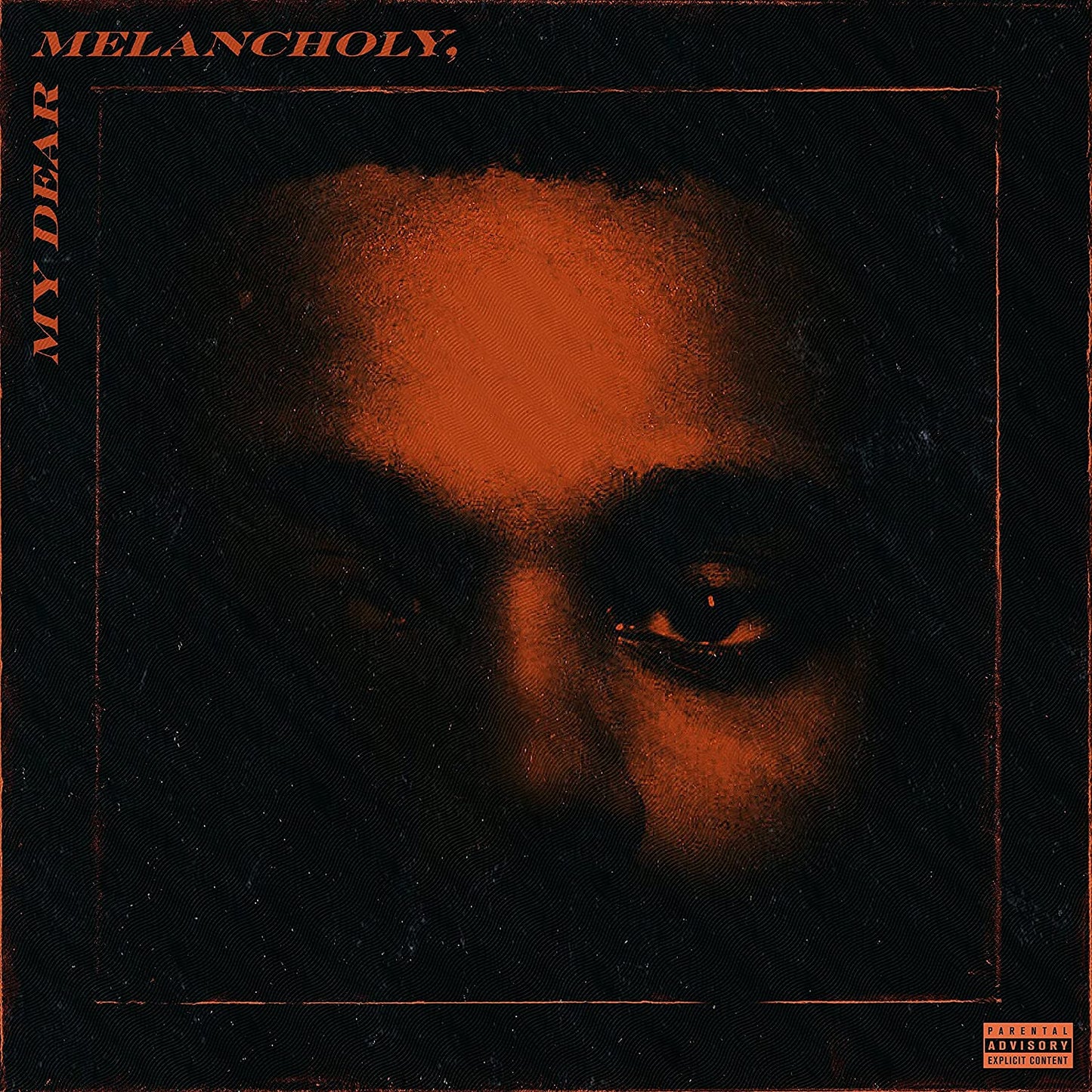 "Black vinyl record cover with orange text and a man's face in shadows."