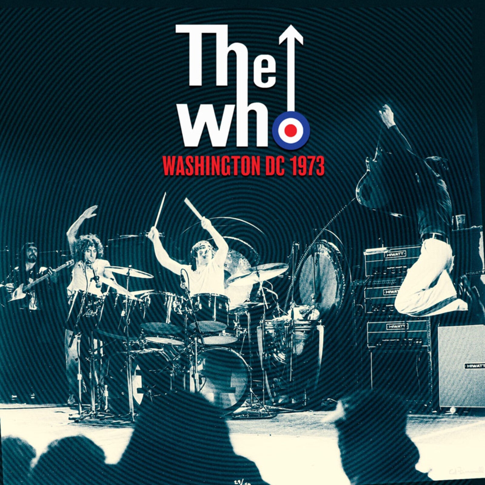 The Who performing live on stage in Washington DC in 1973 with circular background patterns.