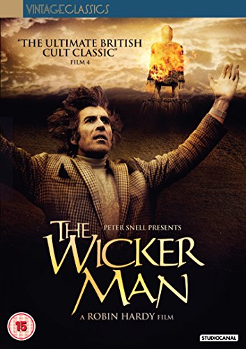 DVD cover art for The Wicker Man showing a man reaching toward a burning effigy.