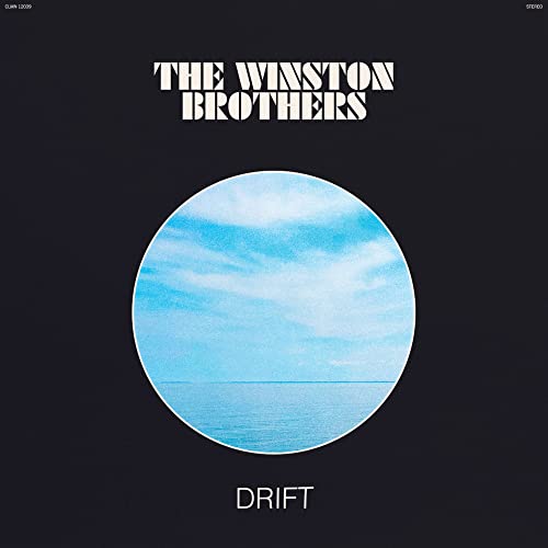 Album cover with a circular image of a blue sky and sea on black.