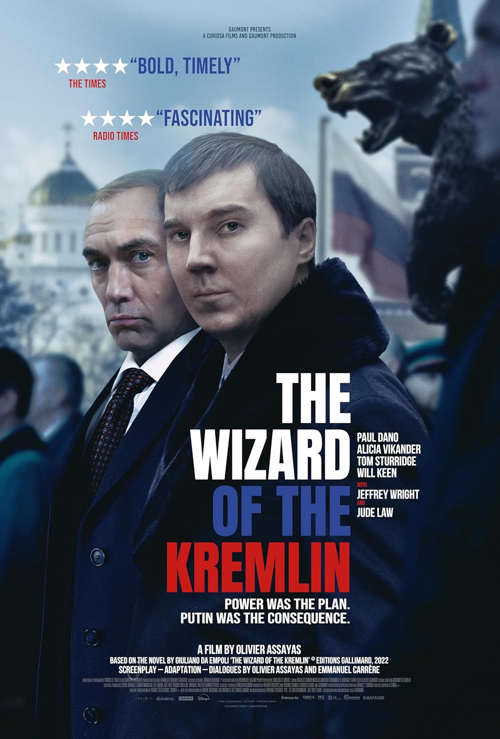 Movie poster for "The Wizard of the Kremlin" featuring two men in suits.