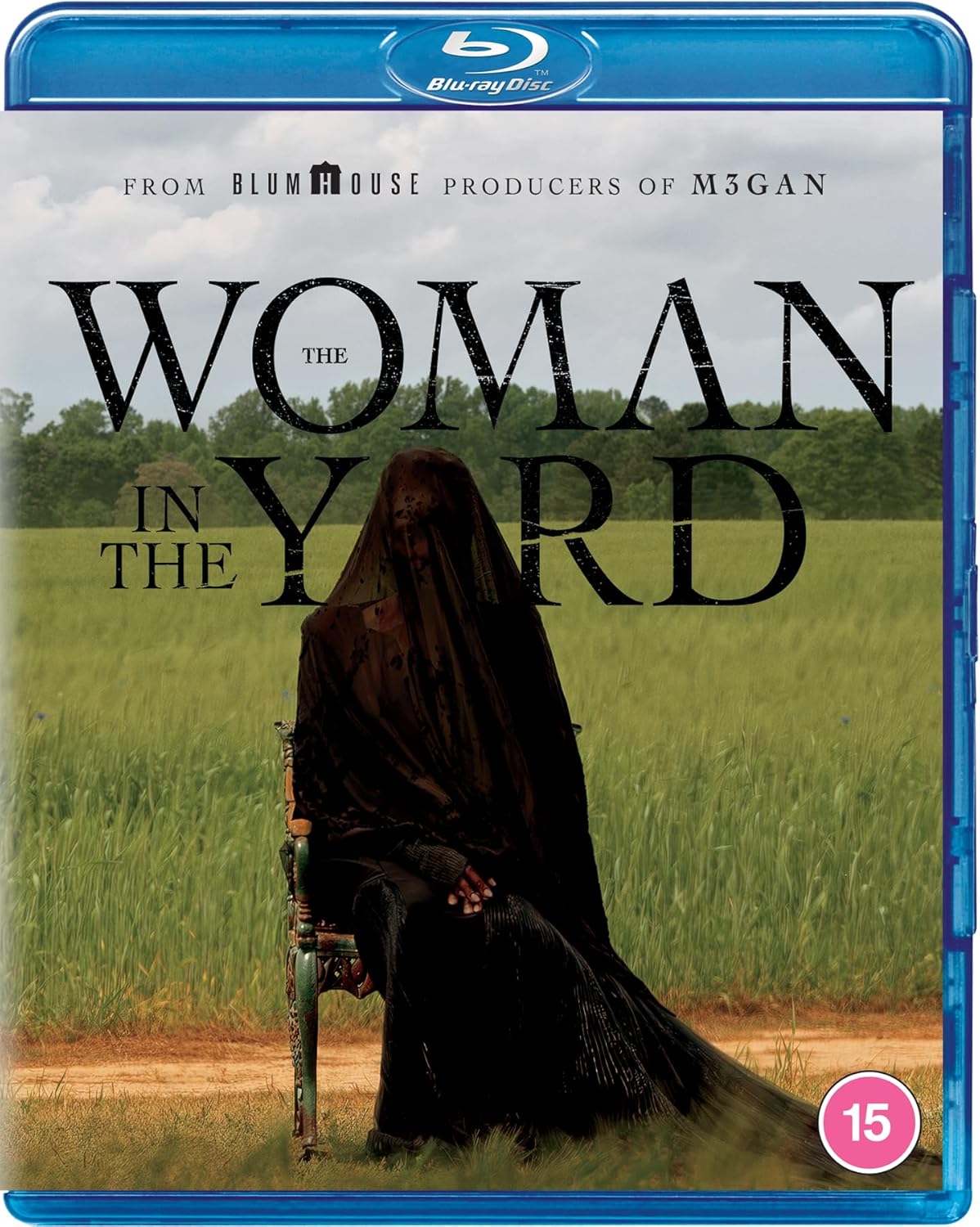 Blu-ray cover for "The Woman in the Yard" featuring a woman in a field.