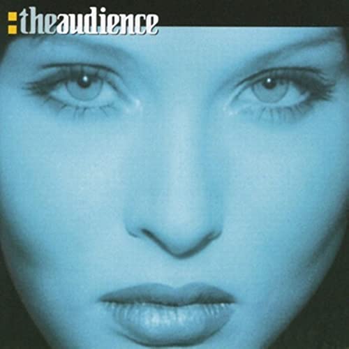 Close-up of a woman's face in blue tones with the text theaudience above.