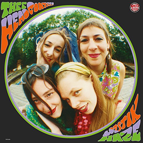 Album cover for Thee Headcoatees’ “Bozstik Haze” featuring four women.