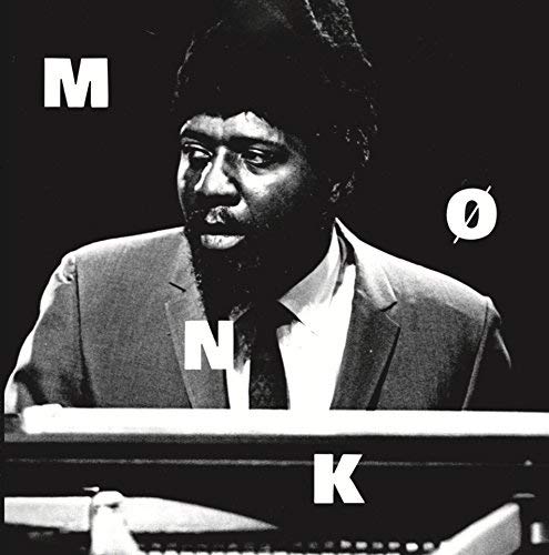 Black and white image of Thelonious Monk playing piano with his name spelled out.