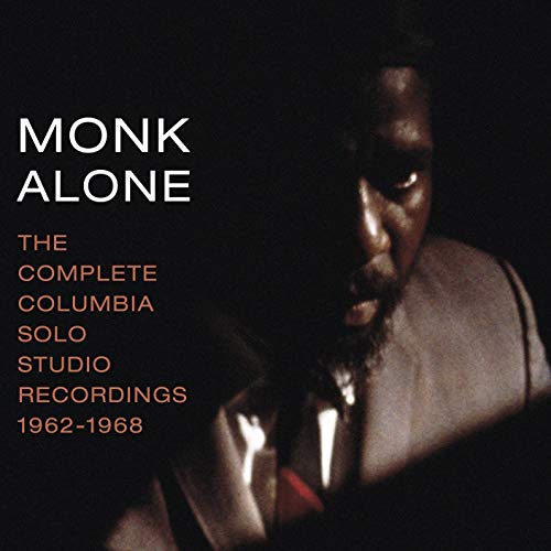 Album cover featuring a dimly lit portrait of Thelonious Monk with white and orange text.