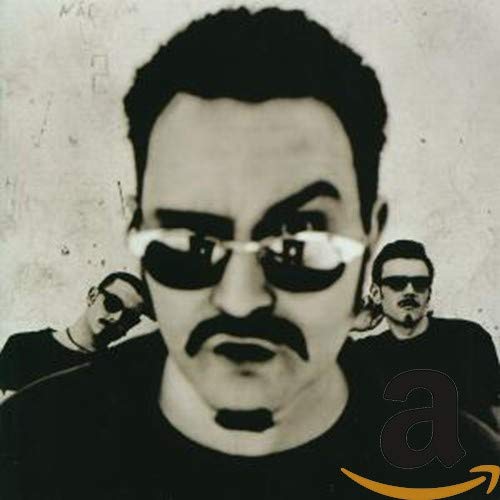 Black and white CD cover featuring a man with sunglasses and two others.