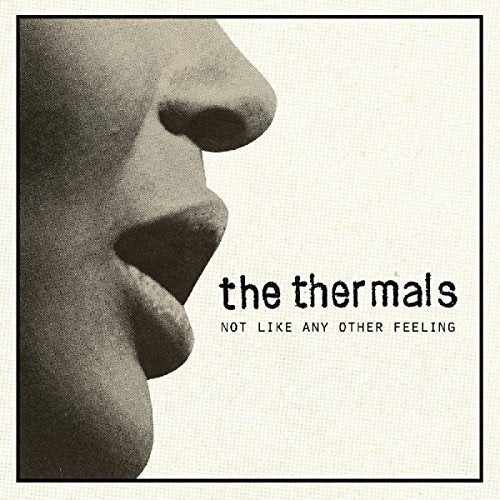 Close-up of a face with album title “The Thermals” below.