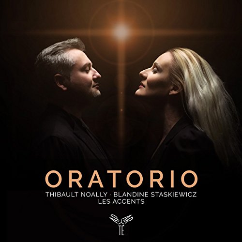 CD cover: two faces in profile looking up towards a bright light.