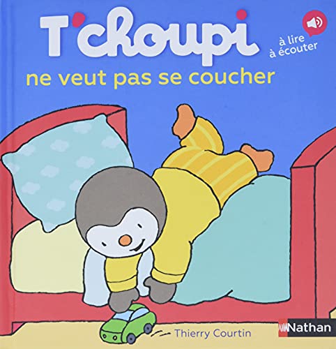 T'choupi in yellow pajamas playing with a toy car on his bed.
