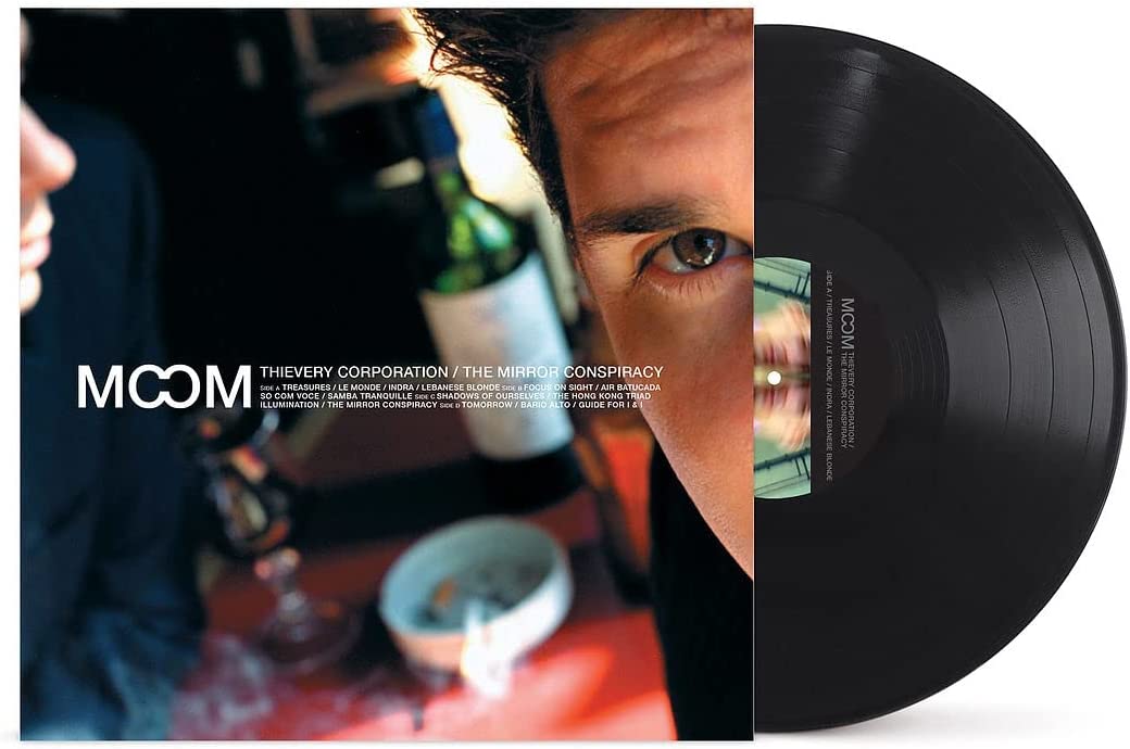 Thievery Corporation’s “Mirror Conspiracy” vinyl record with eye-focused cover art.