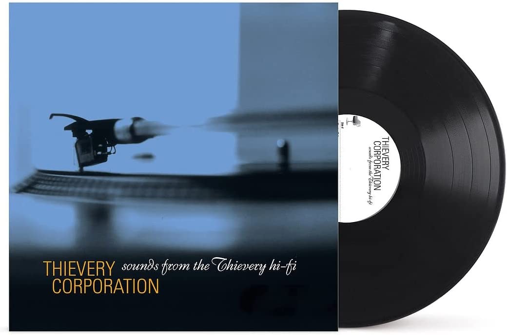 "Vinyl record with blue-toned album cover featuring a tonearm and 'Thievery Corporation' text."