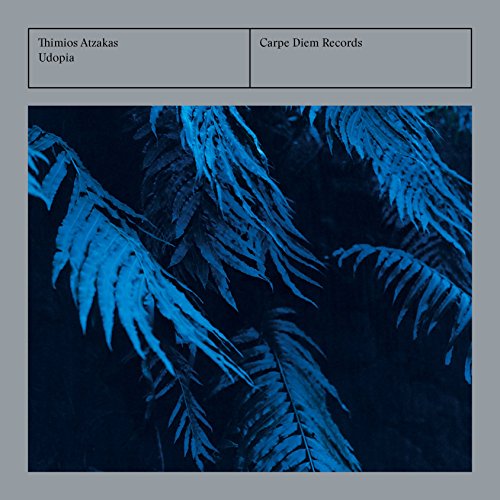 "Album cover with blue ferns on a gray background, artist and record label names."