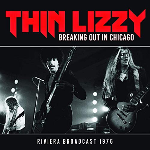 Thin Lizzy album cover: band performing live in black and white.