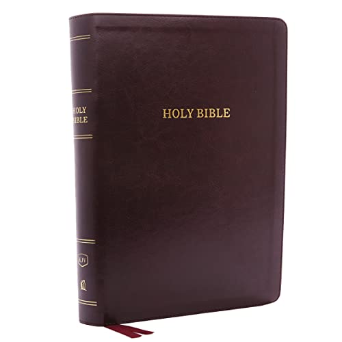 Burgundy leather-bound Bible, closed, with gold lettering and a ribbon bookmark.