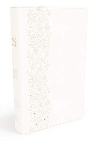 White Bible with floral design on cover, standing upright on plain background.