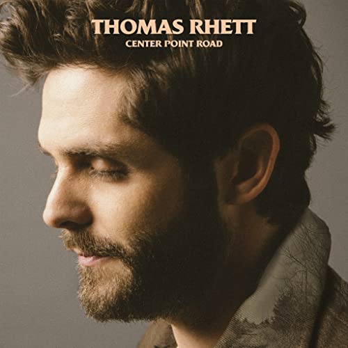 Thomas Rhett album cover, close-up portrait of a bearded man.