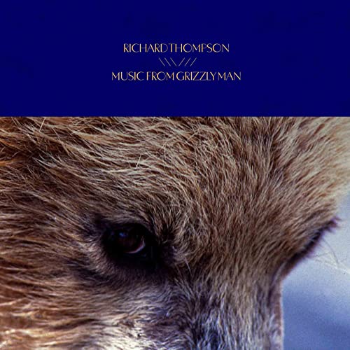 CD cover for “Grizzly Man” soundtrack, featuring a close-up of a bear’s eye.
