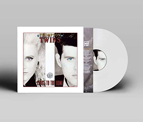 White vinyl record with album cover featuring black and white faces and red text.