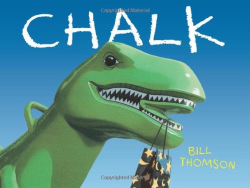 A green dinosaur toy holds a patterned paper bag in its mouth against blue.