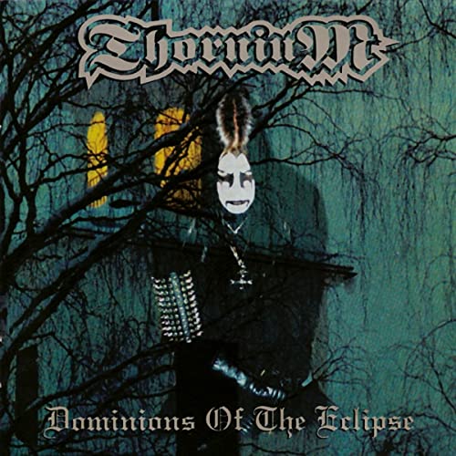 CD cover: masked figure in dark clothing against a teal and black background.