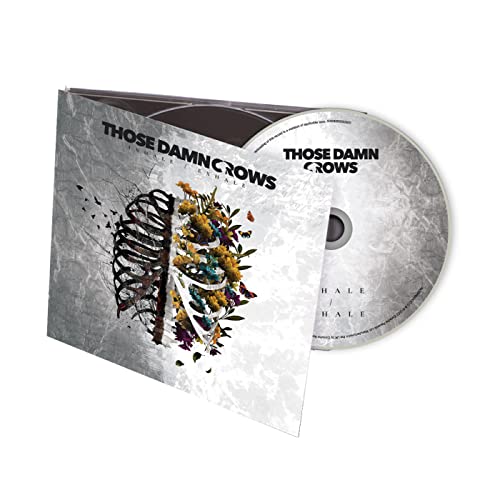 “Those Damn Crows” CD case with colorful, split floral and skull design.
