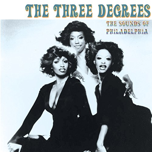 CD cover featuring three Black women with large afro hairstyles.