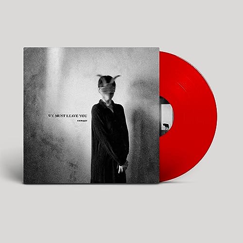 Vinyl record with blurred figure in black and red side.