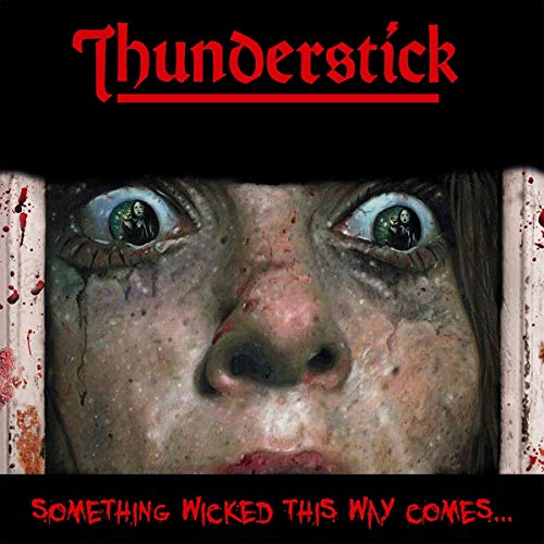 Album cover: close-up of a frightened face with eyes reflecting a small scene.