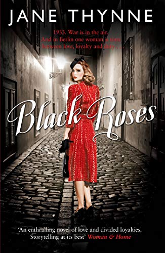 Book cover: woman in red dress standing on a cobblestone street.