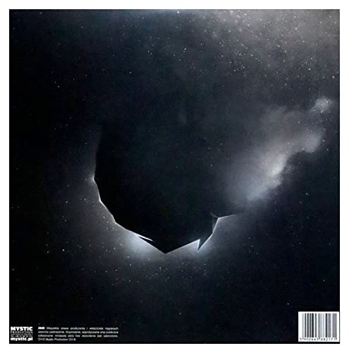 Dark nebula image with a jagged, broken shape and barcode on right.