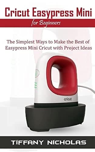 Cricut EasyPress Mini heat press machine on a black base.