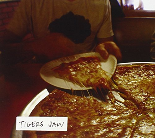 CD cover with a person holding a slice of cheese pizza.