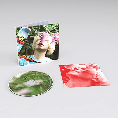 CD case, disc, and insert for Tim Burgess’s “Typical Music” album.