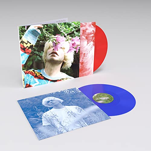 Vinyl record of Tim Burgess’ “Typical Music” with colorful cover art.