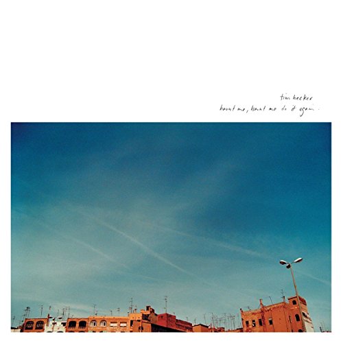 CD album cover: blue sky over rooftops and power lines.