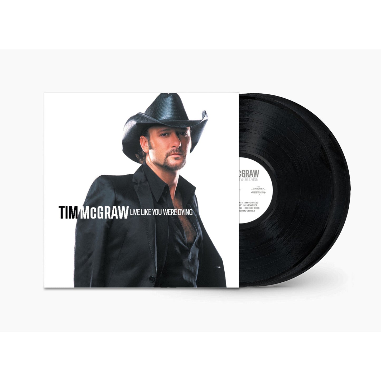 Tim McGraw album cover and black vinyl record displayed together.