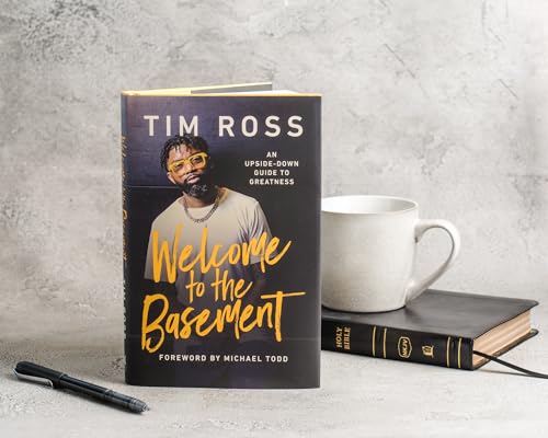 Book cover with a man’s portrait, a mug, and a Bible on a table.