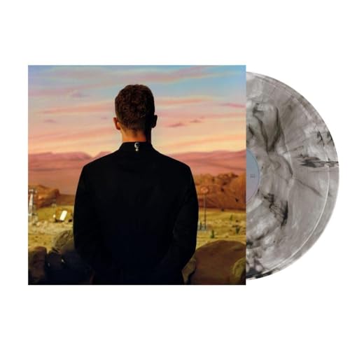 Justin Timberlake album cover with vinyl record, desert landscape backdrop.