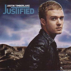Justin Timberlake album cover, “Justified,” featuring a portrait of the artist.
