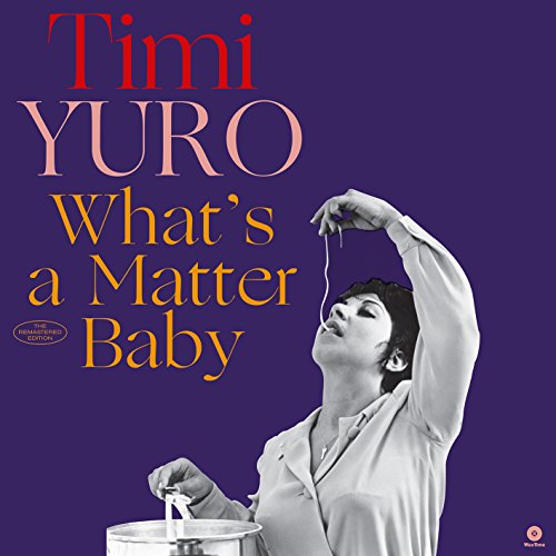 Vintage vinyl record cover featuring Timi Yuro and bold text.