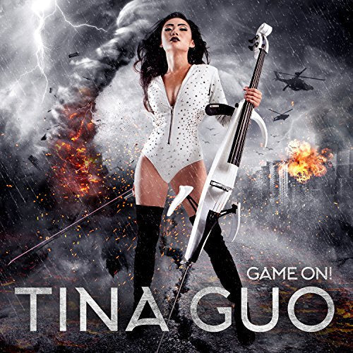 Tina Guo holds a white electric cello amidst a stormy, explosive background.